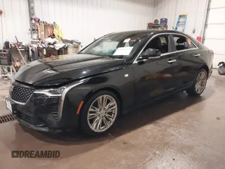 2021 Cadillac CT4 Premium Luxury z VIN 1G6DF5RK6M0133758, wystawiony jako IAAI lot #40832245 z przebiegiem 13 543 mil mil oraz . Historia ofert i sprzedaży dostępna na DreamBid. Obrazek 2.