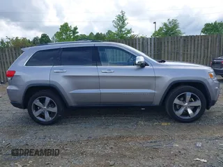 2014 Jeep Grand Cherokee Limited with VIN 1C4RJEBG0EC547674, listed as a IAAI auction lot 42198600 with 122,969 mi miles and . Bid and sale history available at DreamBid. Image 13.