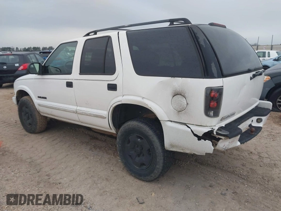 2004 Chevrolet Blazer LS z VIN 1GNDT13X34K157711, wystawiony jako IAAI lot #41282289 z przebiegiem 148 013 mil mil oraz . Historia ofert i sprzedaży dostępna na DreamBid. Obrazek 3.