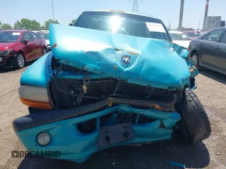 1997 Dodge Dakota z VIN 1B7GG26Y5VS253054, wystawiony jako IAAI lot #42215925 z przebiegiem 125 768 mil mil oraz . Historia ofert i sprzedaży dostępna na DreamBid. Obrazek 12.