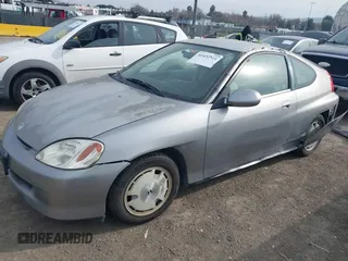 2001 Honda Insight z VIN JHMZE14741T003228, wystawiony jako IAAI lot #41432511 z przebiegiem 227 809 mil mil oraz . Historia ofert i sprzedaży dostępna na DreamBid. Obrazek 2.