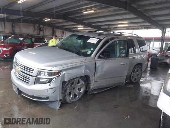 2015 Chevrolet Tahoe LTZ with VIN 1GNSCCKC5FR123099, listed as a IAAI auction lot 41391974 with Not provided miles and . Bid and sale history available at DreamBid. Image 14.