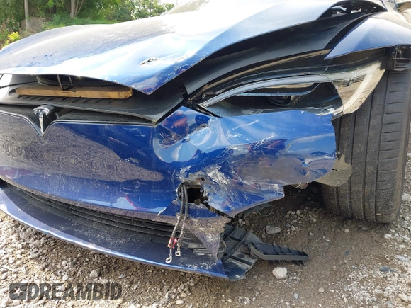2022 Tesla Model S with VIN 5YJSA1E55NF486443, listed as a IAAI auction lot 42720110 with Not provided miles and . Bid and sale history available at DreamBid. Image 23.