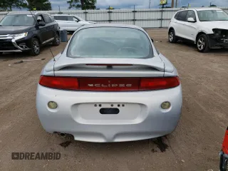 1999 Mitsubishi Eclipse RS with VIN 4A3AK34Y4XE055125, listed as a Copart auction lot 73249544 with 100,125 mi miles and Clean Title. Bid and sale history available at carsss.com. Image 6.