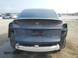 2022 Tesla Model Y Performance with VIN 7SAYGDEF4NF447462, listed as a Copart auction lot 58306595 with 61,671 mi miles and Non repairable. Bid and sale history available at DreamBid. Image 6.