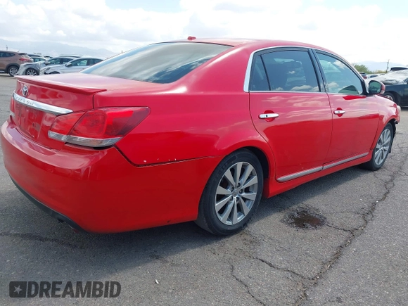 2011 Toyota Avalon with VIN 4T1BK3DB3BU404093, listed as a IAAI auction lot 42163714 with 129,847 mi miles and . Bid and sale history available at carsss.com. Image 4.