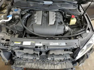 2016 Volkswagen Touareg Sport z VIN WVGEP9BPXGD006774, wystawiony jako Copart lot #56045495 z przebiegiem 85 695 mil mil oraz Szkoda całkowita • Salvage title. Historia ofert i sprzedaży dostępna na DreamBid. Obrazek 11.