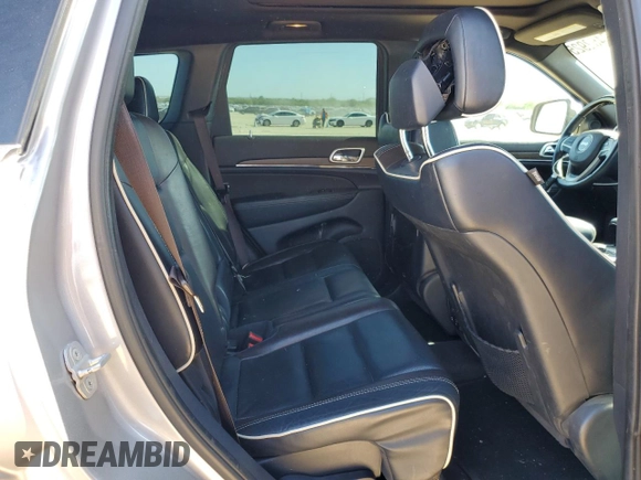 2014 Jeep Grand Cherokee Overland with VIN 1C4RJFCG7EC153156, listed as a Copart auction lot 52452925 with 152,348 mi miles and Salvage Title. Bid and sale history available at DreamBid. Image 11.