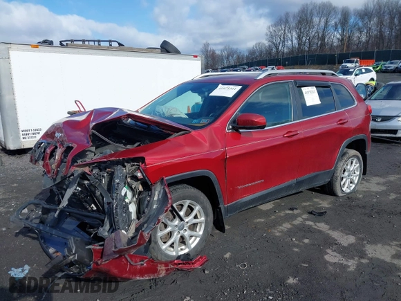 2014 Jeep Cherokee Latitude z VIN 1C4PJMCSXEW141453, wystawiony jako IAAI lot #41975311 z przebiegiem 150 085 mil mil oraz . Historia ofert i sprzedaży dostępna na DreamBid. Obrazek 17.