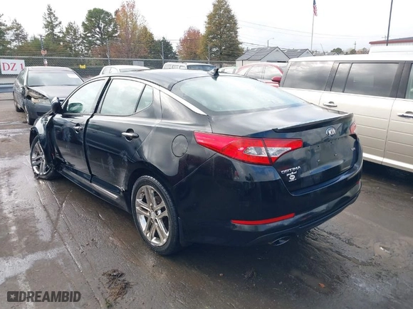 2013 Kia Optima SX w/Limited Pkg with VIN 5XXGR4A6XDG121265, listed as a IAAI auction lot 40771144 with 129,247 mi miles. Bid and sale history available at carsss.com. Image 3.
