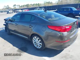 2014 Kia Optima EX z VIN 5XXGN4A71EG346924, wystawiony jako IAAI lot #41863871 z przebiegiem 230 605 mil mil oraz . Historia ofert i sprzedaży dostępna na DreamBid. Obrazek 3.