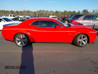 2021 Dodge Challenger R/T Scat Pack z VIN 2C3CDZFJ9MH637240, wystawiony jako IAAI lot #41411595 z przebiegiem 13 175 mil mil oraz . Historia ofert i sprzedaży dostępna na DreamBid. Obrazek 14.