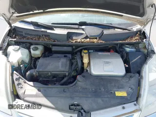 2007 Toyota Prius with VIN JTDKB20U777634652, listed as a IAAI auction lot 42182657 with 200,657 mi miles and . Bid and sale history available at DreamBid. Image 10.