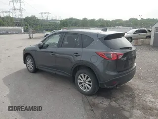 2014 Mazda CX-5 Touring z VIN JM3KE4CY2E0348500, wystawiony jako IAAI lot #42318155 z przebiegiem 182 616 mil mil oraz . Historia ofert i sprzedaży dostępna na DreamBid. Obrazek 3.
