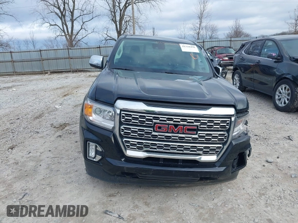 2021 GMC Canyon 4WD Denali with VIN 1GTG6EEN9M1221529, listed as a IAAI auction lot 41228498 with 67,727 mi miles. Bid and sale history available at carsss.com. Image 12.