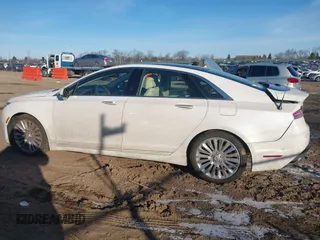 2014 Lincoln MKZ with VIN 3LN6L2GK3ER800458, listed as a IAAI auction lot 41233924 with 106,048 mi miles. Bid and sale history available at carsss.com. Image 14.