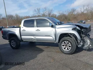 2018 Toyota Tacoma SR5 with VIN 5TFAZ5CN6JX057889, listed as a IAAI auction lot 41449604 with 114,888 mi miles and . Bid and sale history available at DreamBid. Image 13.