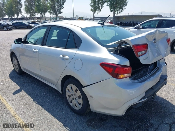 2018 Kia Rio LX with VIN 3KPA24AB4JE086105, listed as a IAAI auction lot 42062323 with 128,289 mi miles. Bid and sale history available at carsss.com. Image 3.