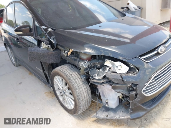 2013 Ford C-Max SE z VIN 1FADP5AUXDL511432, wystawiony jako IAAI lot #42314733 z przebiegiem 140 616 mil mil oraz . Historia ofert i sprzedaży dostępna na DreamBid. Obrazek 6.