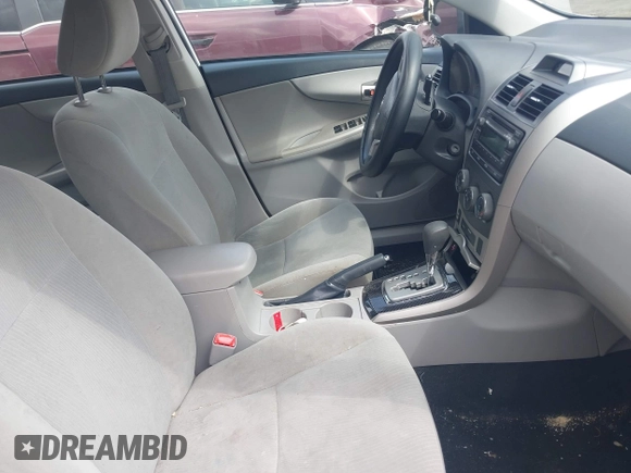 2012 Toyota Corolla L with VIN 2T1BU4EE4CC884754, listed as a IAAI auction lot 42041998 with 113,615 mi miles. Bid and sale history available at carsss.com. Image 5.