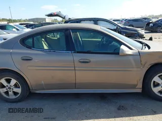 2006 Pontiac Grand Prix z VIN 2G2WP552X61161972, wystawiony jako IAAI lot #41825581 z przebiegiem 264 069 mil mil oraz . Historia ofert i sprzedaży dostępna na DreamBid. Obrazek 13.