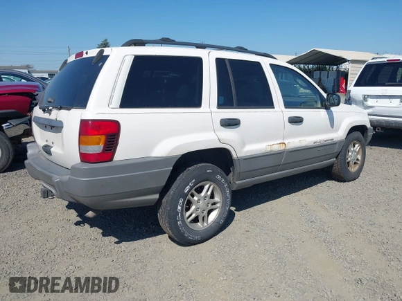 2002 Jeep Grand Cherokee Laredo with VIN 1J4GW48SX2C247709, listed as a IAAI auction lot 42444030 with 196,591 mi miles and . Bid and sale history available at DreamBid. Image 4.