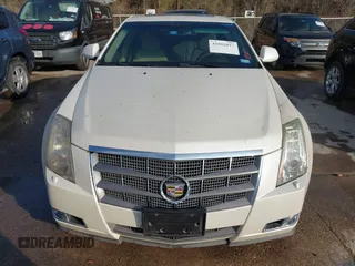 2009 Cadillac CTS AWD z VIN 1G6DT57VX90140080, wystawiony jako IAAI lot #41802817 z przebiegiem 146 978 mil mil oraz . Historia ofert i sprzedaży dostępna na DreamBid. Obrazek 6.