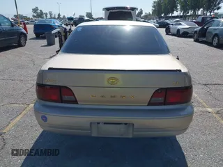 1996 Toyota Camry DX z VIN JT2BG12K0T0347950, wystawiony jako IAAI lot #42248890 z przebiegiem 264 017 mil mil oraz . Historia ofert i sprzedaży dostępna na DreamBid. Obrazek 16.