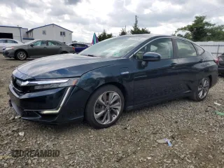 2018 Honda Clarity Touring z VIN JHMZC5F31JC004778, wystawiony jako Copart lot #64885895 z przebiegiem 92 380 mil mil oraz Szkoda całkowita • Salvage title. Historia ofert i sprzedaży dostępna na DreamBid. Obrazek 1.
