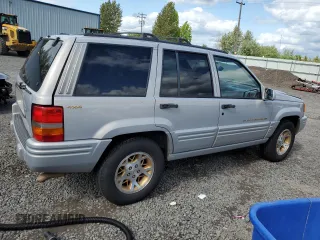 1998 Jeep Grand Cherokee Limited с VIN 1J4GZ78Y0WC245194, выставлен на аукционе Copart как лот 57838825 с пробегом 199 412 миль миль и Списание • Salvage title. История ставок и продаж доступна на DreamBid. Изображение 3.