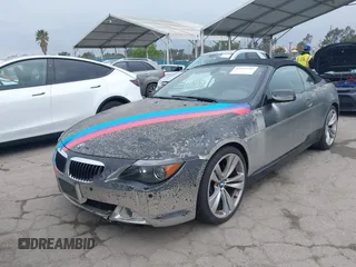 2007 BMW 6 Series 650i with VIN WBAEK13507CN81020, listed as a IAAI auction lot 42167743 with 127,552 mi miles and . Bid and sale history available at carsss.com. Image 2.