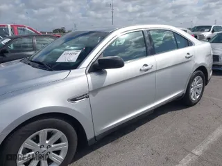 2011 Ford Taurus SE with VIN 1FAHP2DW3BG118603, listed as a IAAI auction lot 41944340 with 34,451 mi miles. Bid and sale history available at carsss.com. Image 6.