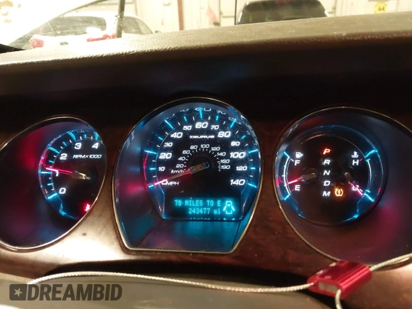 2010 Ford Taurus Limited with VIN 1FAHP2FW9AG133764, listed as a IAAI auction lot 41823527 with 243,477 mi miles and . Bid and sale history available at DreamBid. Image 7.