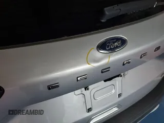2020 Ford Escape SE with VIN 1FMCU9G69LUA97708, listed as a IAAI auction lot 42624966 with 74,975 mi miles and . Bid and sale history available at DreamBid. Image 21.