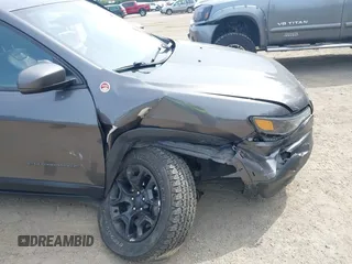 2019 Jeep Cherokee Trailhawk with VIN 1C4PJMBX2KD231734, listed as a IAAI auction lot 42235469 with 104,565 mi miles and . Bid and sale history available at DreamBid. Image 6.