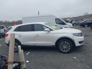 2016 Lincoln MKX Select with VIN 2LMTJ6KRXGBL66906, listed as a IAAI auction lot 41793955 with 159,046 mi miles. Bid and sale history available at carsss.com. Image 13.