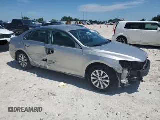 2014 Volkswagen Passat Wolfsburg Edition with VIN 1VWAT7A39EC095920, listed as a Copart auction lot 56628415 with 103,492 mi miles and Salvage title. Bid and sale history available at DreamBid. Image 4.