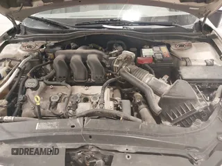 2007 Ford Fusion SEL with VIN 3FAHP02187R185614, listed as a IAAI auction lot 42027597 with 165,466 mi miles. Bid and sale history available at carsss.com. Image 10.
