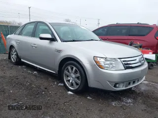 2008 Ford Taurus SEL with VIN 1FAHP24W68G122802, listed as a IAAI auction lot 42020217 with 168,265 mi miles. Bid and sale history available at carsss.com. Image 1.