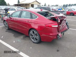 2019 Ford Fusion Titanium with VIN 3FA6P0K98KR179513, listed as a IAAI auction lot 41820059 with 112,155 mi miles. Bid and sale history available at carsss.com. Image 3.
