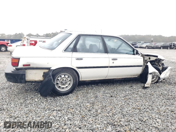 1988 Toyota Camry z VIN JT2SV21E7J3277138, wystawiony jako Copart lot #80039334 z przebiegiem 152 555 mil mil oraz Szkoda całkowita • Salvage title. Historia ofert i sprzedaży dostępna na DreamBid. Obrazek 3.