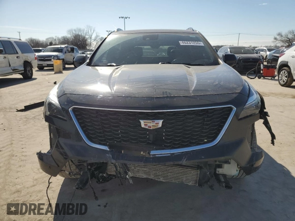 2020 Cadillac XT4 FWD Sport with VIN 1GYFZER49LF024652, listed as a Copart auction lot 46231255 with 87,567 mi miles and Salvage title. Bid and sale history available at DreamBid. Image 5.