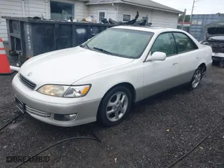2000 Lexus ES 300 with VIN JT8BF28G3Y0246877, listed as a IAAI auction lot 40365916 with 153,569 mi miles. Bid and sale history available at carsss.com. Image 2.