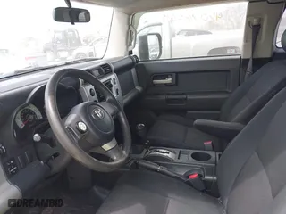 2007 Toyota FJ Cruiser with VIN JTEBU11F270030712, listed as a IAAI auction lot 42076564 with 265,000 mi miles. Bid and sale history available at carsss.com. Image 5.