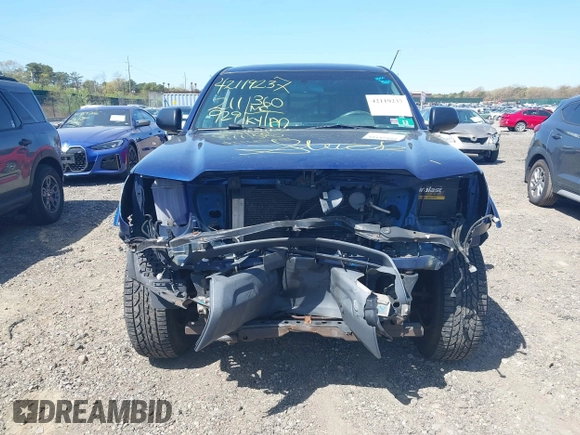 2014 Toyota Tacoma with VIN 3TMLU4EN4EM154261, listed as a IAAI auction lot 42119237 with 211,929 mi miles and . Bid and sale history available at DreamBid. Image 6.