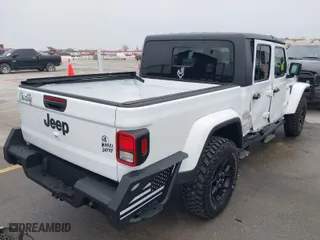 2021 Jeep Gladiator Willys with VIN 1C6HJTAG1ML575474, listed as a IAAI auction lot 41439898 with 44,335 mi miles. Bid and sale history available at carsss.com. Image 4.