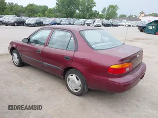 1998 Chevrolet Prizm Lsi z VIN 1Y1SK528XWZ423879, wystawiony jako IAAI lot #42522200 z przebiegiem 171 445 mil mil oraz . Historia ofert i sprzedaży dostępna na DreamBid. Obrazek 3.