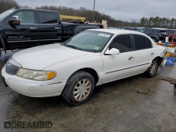 1999 Lincoln Continental with VIN 1LNHM97V3XY667567, listed as a Copart auction lot 84194854 with 137,163 mi miles and Salvage Title. Bid and sale history available at carsss.com. Image 1.