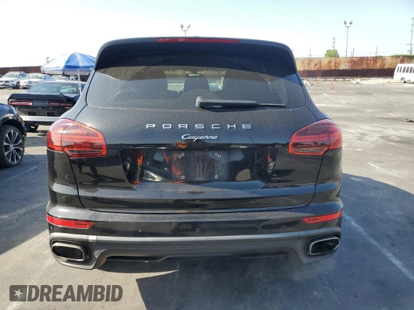 2017 Porsche Cayenne with VIN WP1AA2A20HKA80640, listed as a Copart auction lot 61038585 with 60,893 mi miles and Salvage title. Bid and sale history available at DreamBid. Image 6.