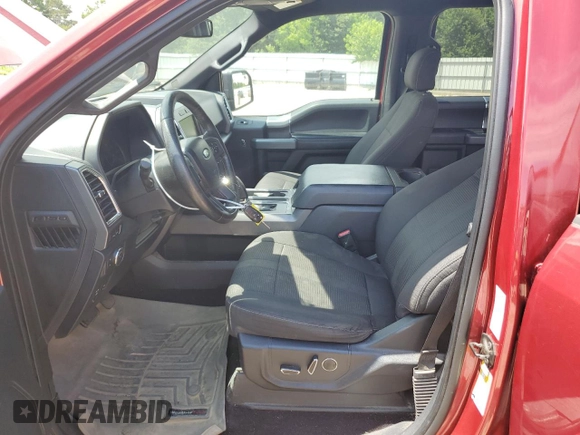 2015 Ford F-150 XLT with VIN 1FTEW1EP7FFD01693, listed as a Copart auction lot 62568385 with 190,871 mi miles and Salvage title. Bid and sale history available at DreamBid. Image 7.